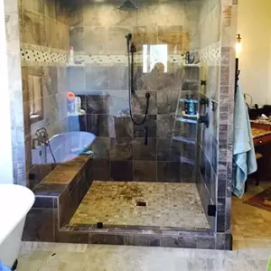 a newly installed frameless shower enclosure in Windsor CO