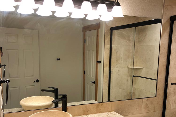 custom fabricated mirror in bathroom