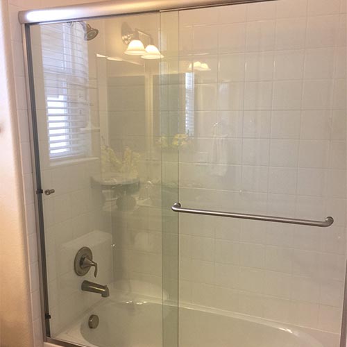 framed shower on tub