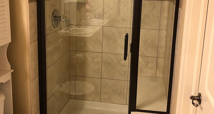 framed shower with seat installed