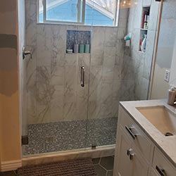 new frameless shower enclosure installed