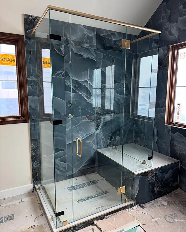 a new frameless glass shower enclosure installed in Louisville, Colorado